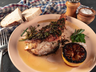 Roasted sea bass with beur Noir sauce and caramelized lemon