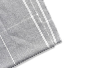 A piece of gray checked fabric is isolated on a white background with an area for text.