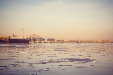 Obraz premium Neva spring at sunset. Center of St. Petersburg in the spring at sunset. Walk through the historic center of St. Petersburg. Spring sunset.