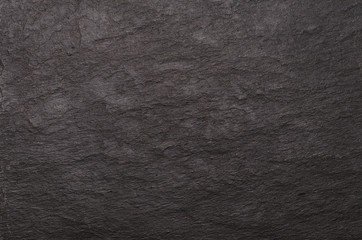Black stone background texture. Dark background for design.