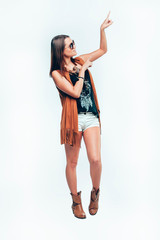 Young girl lifting her hands