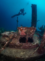 Diver Exploring Shipwreck