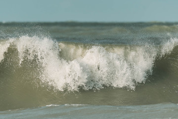 Large waves crashing on the beach 
