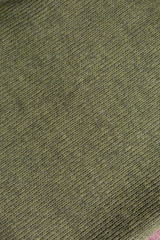 background texture fabric Angora. the fabric is knit. fabric Angora. the fabric is dark green color