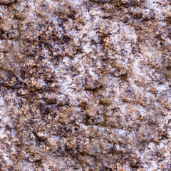 seamless wet beige cave granite wall texture. background, geological.