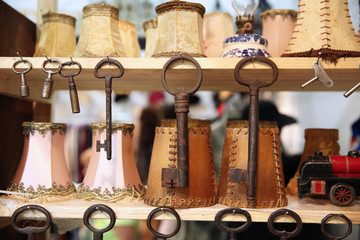 Rusty vintage keys of different size in the flea market