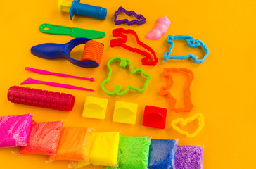 Material and tools for modeling clay. Creative lesson for a child.