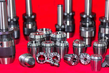 close up many size of milling chuck and collet with component of cnc machine for high precision and...
