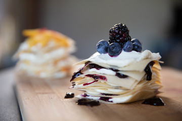 cake with cream and blueberries