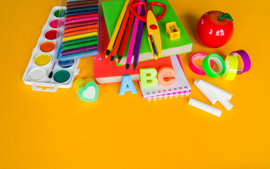 Stationery yellow background. Education. Training material for learning and creativity.