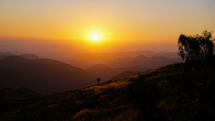 Road Trip from Cuzco to Nazca Exploring the Altiplanos in Peru with its Mountains and Sand Dunes with a Sunset over the Desert
