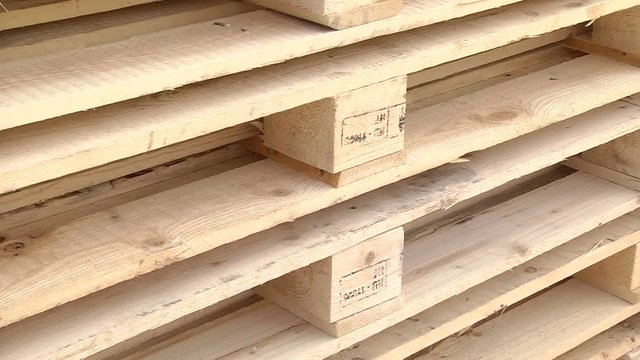 Stacks of wooden Europallets ready for use