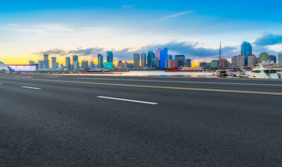 Naklejka premium Urban Road, Highway and Construction Skyline..