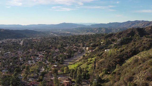 4k North Hollywood Burbank Glendale Pasadena aerial in Los Angeles Highway Mountain City Houses, California