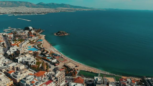 Aerial drone view video of sea near beach with birds fly, Attica, Greece