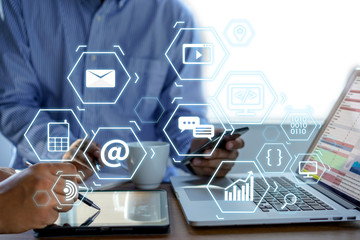 Man using  tablet computer  virtual interface graphic icons network diagram Digital marketing