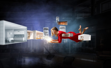 Woman fly in air and use mobile. Mixed media