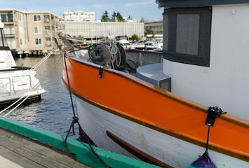 Fototapeta na wymiar Red boat in Kirkland city dock