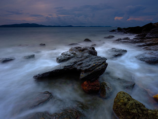 Smooth water at the beach background 