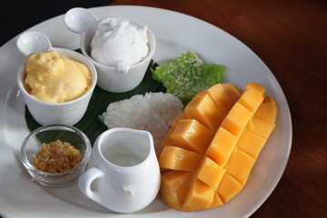 Mango sticky rice is a traditional Thai dessert made with glutinous rice, fresh mango and coconut milk