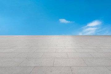 Fototapeta premium Empty square tiles and beautiful sky scenery