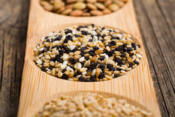 sesame seeds, old wooden table