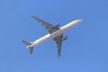 Fototapeta na wymiar Commercial passenger airplane flying