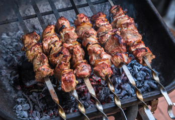 cooking grilled shish kebab on metal skewer fresh meat. cooked at barbecue bbq roasted beef meat