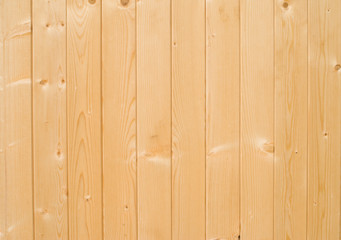 New wooden boards on wall close up