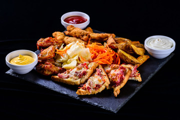 hot sandwiches on a dark background, set of snacks
