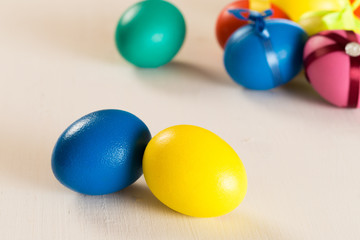 easter eggs on white wooden desk