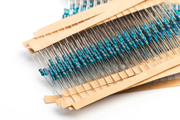 Electronic components: resistors on paper tape isolated on white - Image