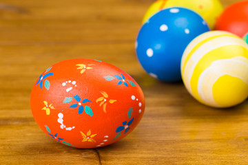 easter eggs on wooden background, close up view