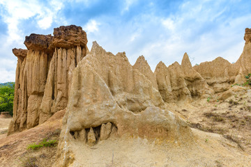 landscape of soil textures eroded sandstone pillars, columns and cliffs, 