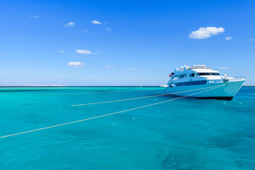 Fototapeta na wymiar White yachts in Red sea not far from the Hurghada city, Egypt