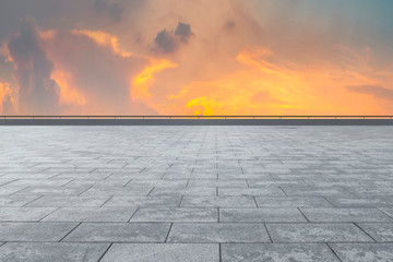 Fototapeta na wymiar Empty square tiles and beautiful sky scenery