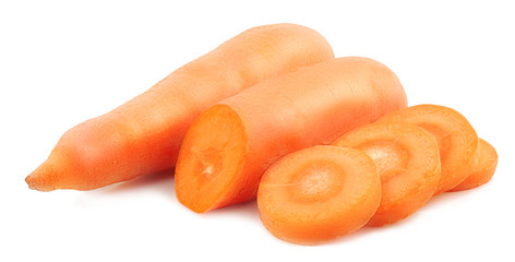 Carrots and slices isolated on white