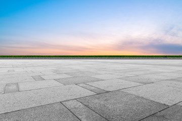 Fototapeta premium Empty square tiles and beautiful sky scenery