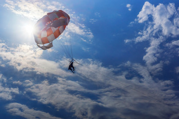 Parachute flight in the sky is active rest on resort