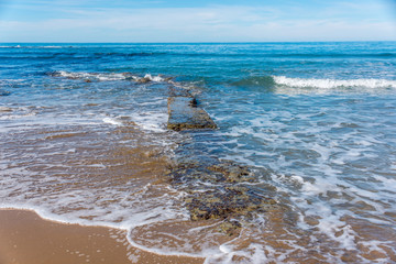 Ancient Roman Sea Wall at a Southern Italian Mediterranean Beach