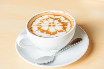 Top view of hot cappuccino with nice milk pattern