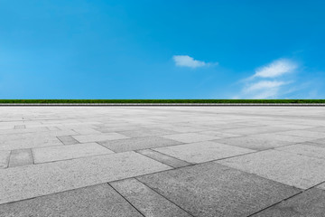 Fototapeta premium Empty square tiles and beautiful sky scenery