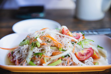 Traditional Thai food called Glass Noodle Pork Nut Spicy Salad