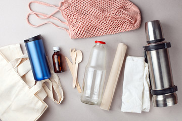 Set for free plastic shopping and packaging - cotton bags and glass gar, paper, steelness bottle. Zero waste modern trendy concept, eco-friendly