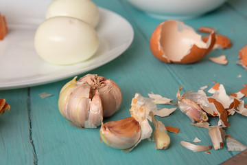 boiled chicken eggs and shell on wooden table