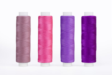 Set of sewing thread coils, miscellaneous colours, isolated on white
