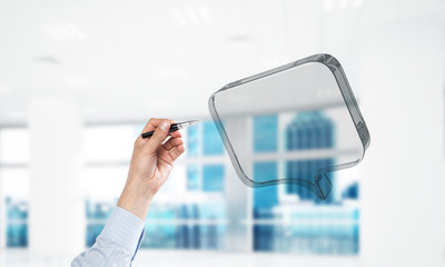 Male hand holding pen and glass icon fly in air. Mixed media