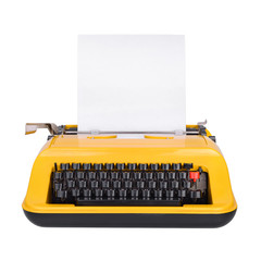 Yellow typewriter isolated on white