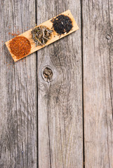 tea crops on bambbo serving tray on old rusty wooden table
