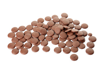 Delicious chocolate chips on white background